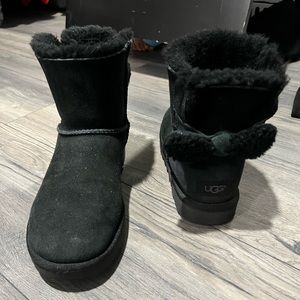 Black Ugg boots with bow on back